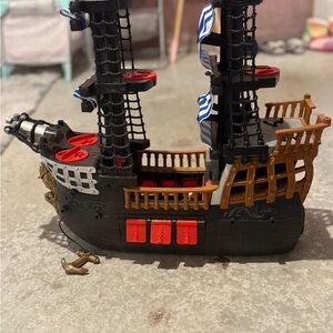 Imaginext Pirate Adventure Ship with pirate figures.